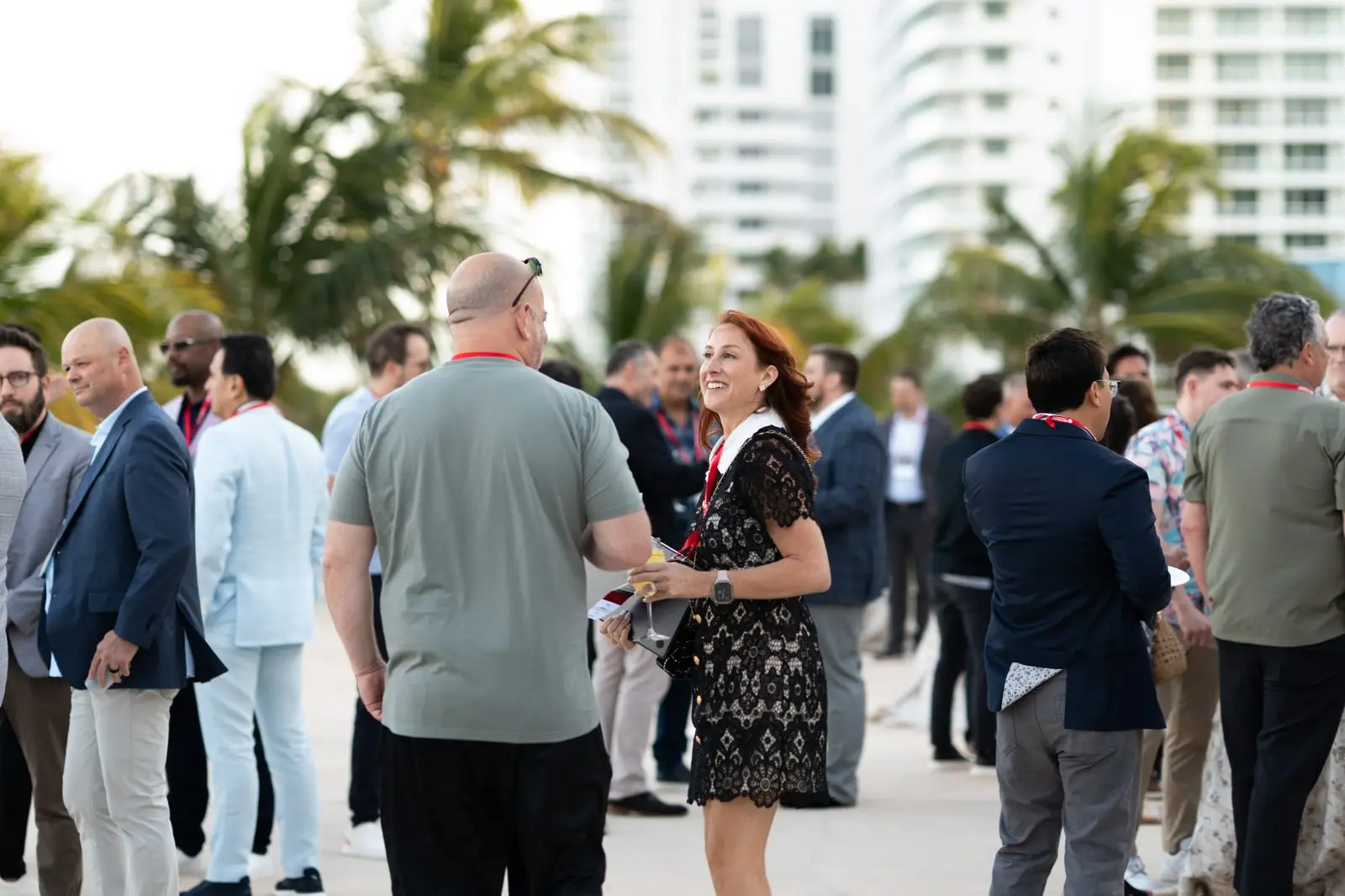 CEOs connecting at an oceanfront Summit reception